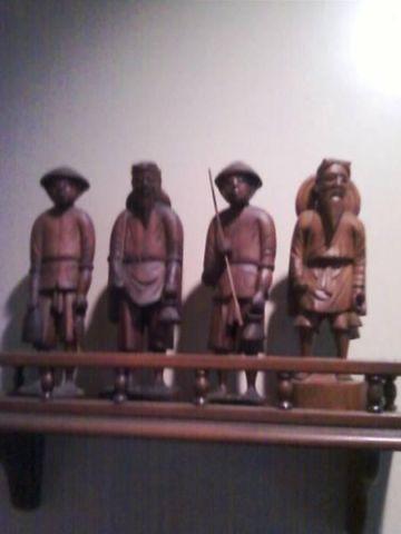 1952 era Hand carved statues from vietnam