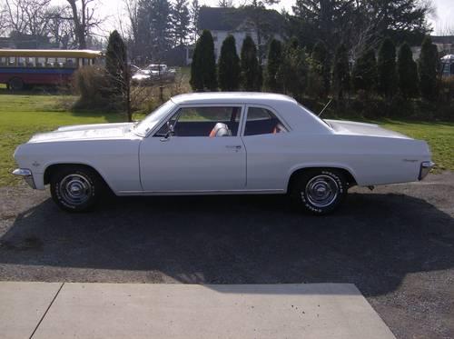 1965 chevrolet biscayne 2 door sedan white exterior / red interior