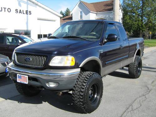 2001 FORD F150 LARIAT Lifted With Mickey Thompsons
