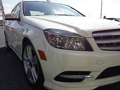 2011 WHITE/BLACK MERCEDES BENZ C300 4MATIC WITH 52K ,SUNROOF,