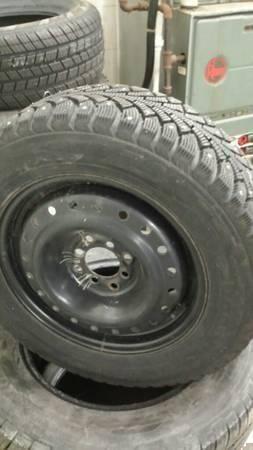4 studded snow tires *good condition*