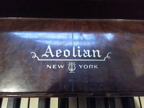 Aeolian upright piano with bench