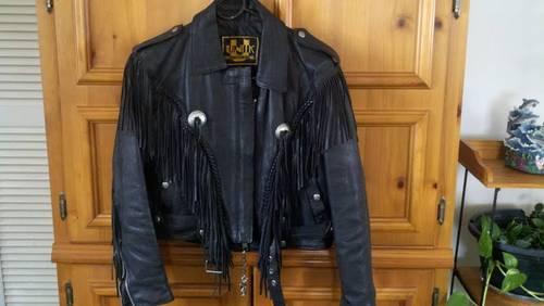 Black leather jacket / with fringe