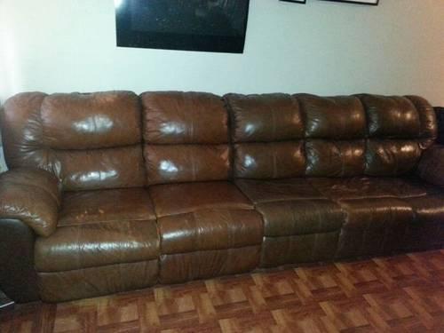 Brown Leather Couch with recliner..MUST GO