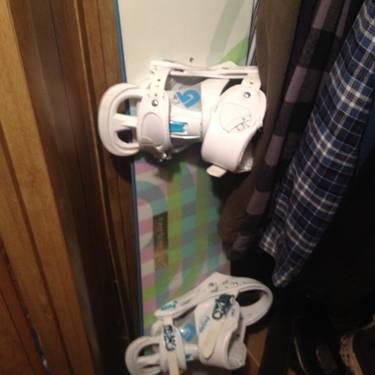 Burton snowboard, burton boots, goggles, and helmet