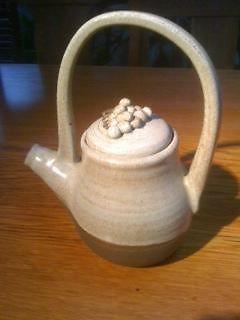 Handmade clay pottery teapot w/ pottery handle and grape clusters lid