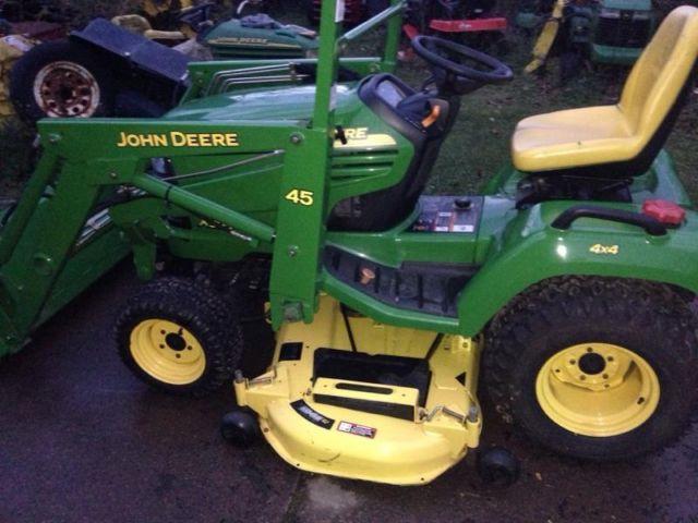 John Deere X585 garden tractor with loader & snowblower