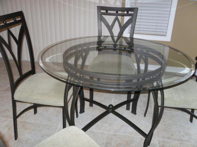 Kitchen high top table and three chairs