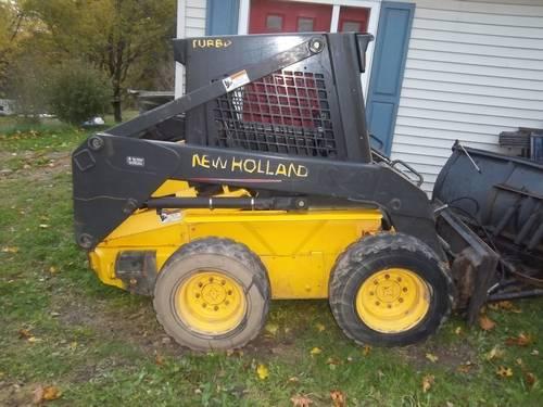 New Holland LS 170 Skid Steer w Bucket: counter weights included