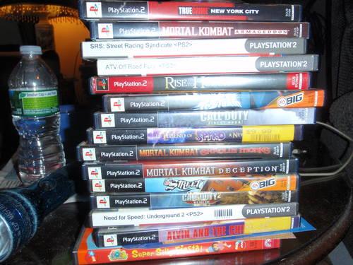 Play Station 2 and lots of games