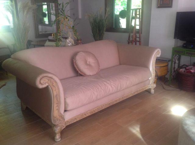 Silk couch with wooden accents