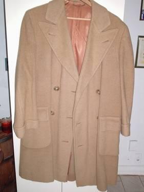 THIS IS A CUSTOM TAILORED GENUINE SHEEPSKIN COAT MADE IN THE USA.