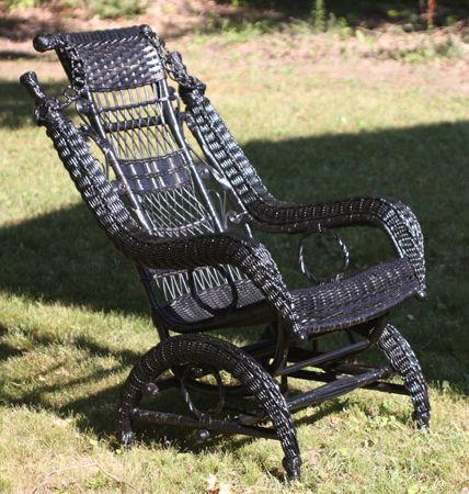 Victorian era platform wicker rocking chair, black