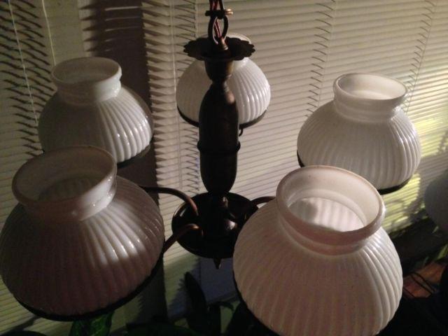 Vintage brass chandelier with 5 milk glass globes