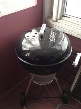 Webber charcoal grill with Budweiser logo