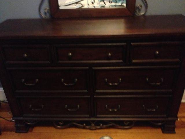 Wood dresser with metal detailing and matching mirror