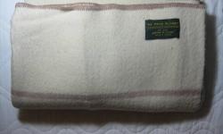 This is a Twin Size (72x90) 100% Itch Free Wool Blanket made by The Maine Blanket Company
Now this is the ultimate "GREEN" source of keeping warm!
Go ahead and lower that thermostat because this blanket will help as a great and efficient insulator to keep