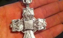 Large 10k wg 4.5ct cross with certificate of authenticity includes 40" 10k wg chain both in mint condition asking less than what it's really worth so your getting it for a steel get back don't hesitate 315-863-9025 txt or leave MSG