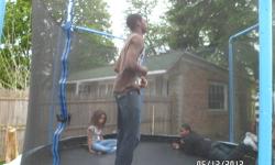 13 foot trampoline w/ center lights and safety net. Comes w/ steps lock and key. Center lights needs (AA or AAA batteries) trampoline is 1 yr old and in great condition. 250 lb weight limit. Asking $200 (not negotiable) or trade for a nice swing set. $40