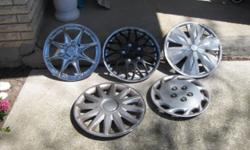 This is a group of aftermarket hubcaps thub caps wheel covers wheelcovers hat I've found over the course of time when I've gone out for walks. They are all in good shape (one has some cracks, as shown in the photos). There are two 15" hubcaps (the all