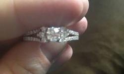 bought this an now really wish I hadn't, I paid with tax and warranty over $2000, it was worn 1 time! It is 14k white gold and has 1ct of GORGEOUS diamonds! I bought the lifetime warranty (warranty includes breakage, loss of diamonds, AND sizing for