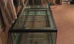 150 gallon tank, no top, 2x2x6, double walled glass enclosure. Could be used for reptiles or fish or just about anything. There is a bridge on the top of the tank that has a crack through one pane of glass. Isn't dangerous.
We are looking for around $500