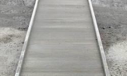 A Magliner 16' aluminum slider ramp. Used for trailer walk ramp but has many other uses. Use it for your shed, a ramp or dock plank for your camp, a ramp for a deck, ect.
The end bar with rollers has been cut off. I still have the carrier if wanted.
$250