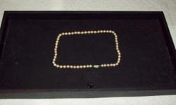 16 INCH BAROQUE PEARL NECKLACE 14K GOLD CLASP $150.00 917-701-3862
PEARLS ARE 5.84 MM EACH
$150.00
917-701-3862
