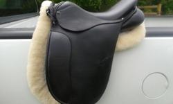 18" Anky Salinero Dressage saddle with Buffalo leather flaps and medium tree in excellent condition.Very comfortable saddle!