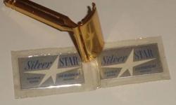 1930-1940 Star Safety Razor w NOS Blades
RICHARDS RAZORS; MAKE ME AN OFFER I CAN'T REFUSE!
1930-1940 Star Safety Razor w NOS Blade, Made in USA by the American Safety
Razor Company. This razor is similar to a Gillette 1940's One-Piece solid
guard bar, it