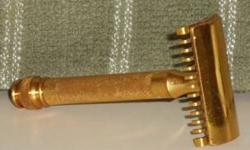 1931 Gillette Goodwill Safety Razor
RICHARDS RAZORS; MAKE ME AN OFFER I CAN'T REFUSE!
This razor, produced in 1931 is in almost mint vintage condition! The gold plating and lacquer
are in tact, and the comb teeth are all straight! A beautiful collectors
