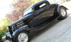 Ford 3-W Coupe. All ORIGINAL Steel...4" Chop...Perfect Black Lacquer...Laser straight body...454/B&M Supercharger with 2 4 barrels...Reverse Valve Body manual trans...3:73 rear...4 wheel disc brakes...Mickey Thompson Tires...Billet Specialties
