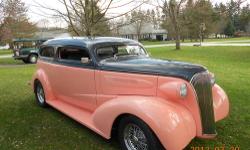 Chopped top, fully custom 1937 Chevy. A/C, power seat, power windows, door poppers, power truck motor, CD player, air ride rear, Nova Clip, Camaro rear end, 350 small block, power steering and brakes. Very nice driver will go anywhere!