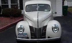 1940 Ford 4-Dr. Deluxe Sedan Street Rod. All Steel Body with original Trim. 305 small block Chevy engine. 350 auto transmission. 8" Ford Rear, power steering, Disc brakes in front, drums in the rear. Dropped front axle. 14" tires front, 15" tires rear.