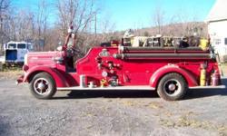 1941 Mack L Firetruck for sale (NY) - $10,900
'41 Mack L open bed Firetruck for sale.
Low miles.
Red exterior with Burgundy Vinyl interior.
Manual V6
1/2 restored.
Everything works - sirens and bells.
Brakes & gas tank are done.
RUNS AND DRIVES!!
No texts