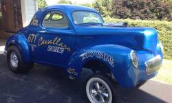 1941 Willys 441 in Excellent Condition Numerous award winner and featured on the Gasser Reunion calendar Body titled as 1941. 396 big block Chevy 4 bolt main block, 8 to 1 compression Forged blower pistons, Alum a coat fender well headers with full 3 inch