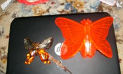 cleer site red-orange butterfly with ladies face, was told bought at gas stations in the 50s. comes with origional hardware and box in good condition. clear one not for sale. just example what it looks like on my car. no nostalgic or remiscience emails