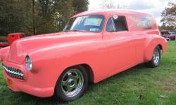 1951 chevy sedan delivery custom.Rebuilt chevy 454 engine and turbo 400 trans.Fast and reliable,drive anywhere.Too many body mods to list. Corvette grille,suicide doors,swivel bucket seats,3 inch exhaust...sounds good !! can send more pictures but should