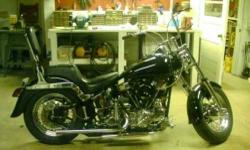 1955 Harley Davidson Panhead This 1955 Harley Davidson Panhead is in good condtiion Primary belt drive S and S carburetor 4 gallon fuel tank Shifton oil pump Electric crank Kick start 4 speed transmission 10,000 miles Never been laid down Black exterior