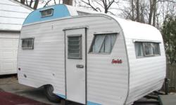 Please view the blog located at the following link for lots of photos and details: http://vintagescottyhilandertraveltrailer.blogspot.com
Trailer has just been freshly air sprayed with new paint after sanding and prepping. Road worthy. Weighs 1526lbs.