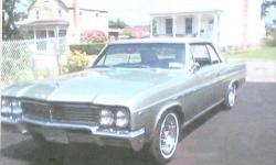 1965 Buick Skylark Light green White top front power disc brakes, ceramic dual exhaust, electronic exhaust, power steering, Rally wheels, whitewalls bucket seats, 62180 original miles, 310 wildcat V8, a restored vehicle, owned it for 5 1/2 years
# 2174004