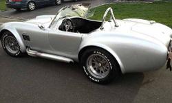 1965 Ford Shelby in Excellent Condition Silver Exterior, Black Leather Interior 427 Roush motor Dyno at 600 horse includes billet air cleaner 750 CFM carburetor billet fuel filters ,standard rotation waterpump Roush AFR CNC ported aluminum heads