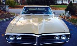 THIS IS ONE BEAUTIFUL ALL ORIGINAL 1967 FIREBIRD THAT IS IN EXCELLENT CONDITION INSIDE AND OUT .
" RARE GOLD ON GOLD EDITION "
HAS ONE PROFESSIONAL REPAINT WITH THE ORIGINAL COLOR A COUPLE YEARS AGO.
ONLY 47000 ORIGINAL DOCUMENTED MILES.
THIS BIRD HAS THE