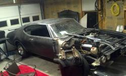 I have a 1969 Olds Cutlass w/ #'s matching suped up 350 Rocket Engine and a spoiler. Also have a hard to find dual exhaust rear bumper for this car (correct light slots )...brand new.
Additional items include extra glove box and center mount console.
I