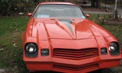 Vintage Z28 Camaro in Pristine condition, and runs better than she did new 1980 Classic orange Z28 Theme with Almond leather seats 100 Miles on drivetrain rebuild Chevy 350 Cu In V8 High Output TH350 Auto trans with Overdrive Am Fm cassette AC Delco