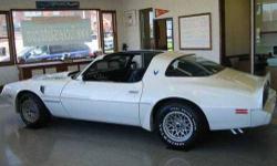 1980 Pontiac Firebird Trans Am in Excellent Condition White Exterior with Firebird Symbol Blue Cloth Interior 4.9 Liter Turbo V8 Engine with 42,070 Miles Automatic Transmission Almost all original with the exception of the radio T Tops, Honey Comb Wheels