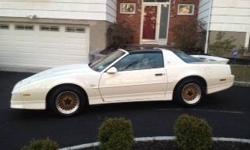 For Sale is my 1987 Pontiac GTA Trans AM. in white, 305 tpi ,automatic od, t top, sw6 package ,loaded. a/c.with a grey cloth interior and original 60k on it.s a true surviver car,and unmolested.a true find. always garaged since new.it retains its original