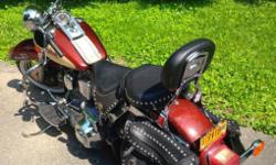 1988 Harley Davidson FST Heritage Soft Tail in Mint Condition with 2-tone paint. In 2013 top end of motor rebuilt, installed brand new white wall tires, new passenger seat, and a host of others things professionally done by Woodstock Harley which equals