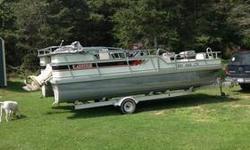 20 foot Lowe pontoon boat, has big oval pontoons, 70 hp johnson. Bimini top, $5000.00 obo. 315 778-0818