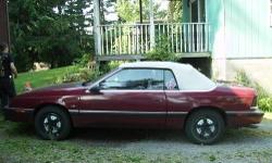 inspected jan.5, 2013.1990 chrysler lebaron convertible. warm weather is almost here. feb-march then april and you can be riding in this. no rust, red with white top. brand new tires-four of them which has 45k mi. warrenty on them. these tires cost me
